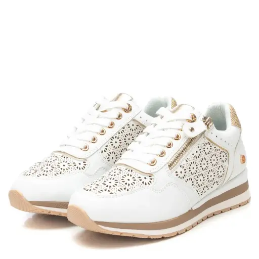 Tenis xti